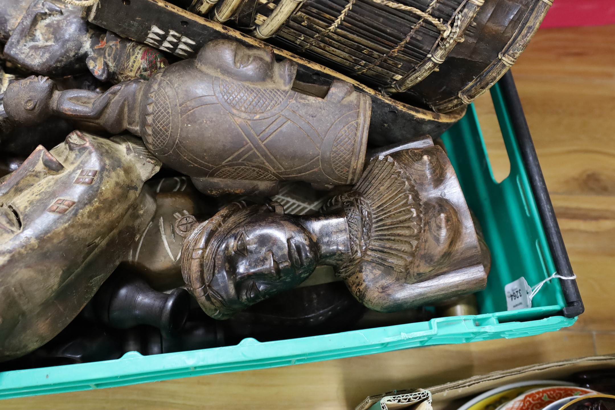 A group of African / Indian wood carvings, masks, etc.